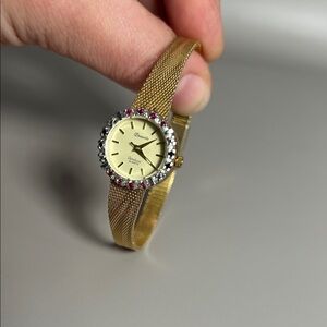 Deauville Gold Tone Mesh Bracelet Watch with Red and Blue Crystal Accents